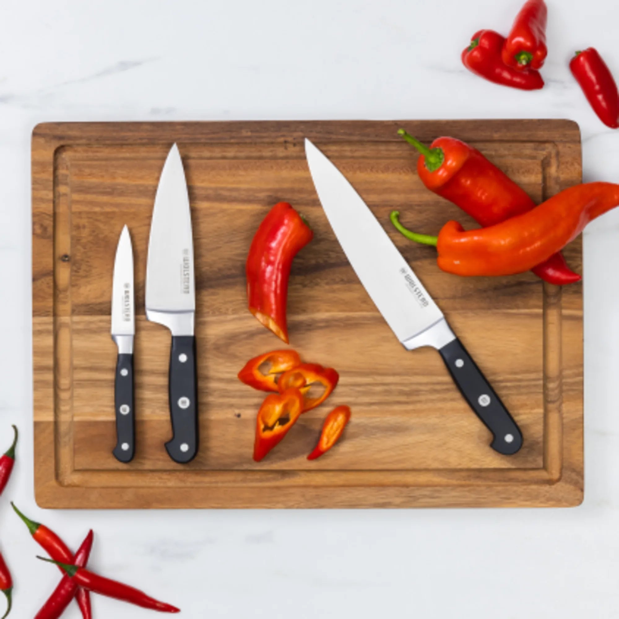 https://www.wolstead.com/cdn/shop/products/Wolstead-Calibre-Chef-Knife-20cm-LS.webp?v=1659603942